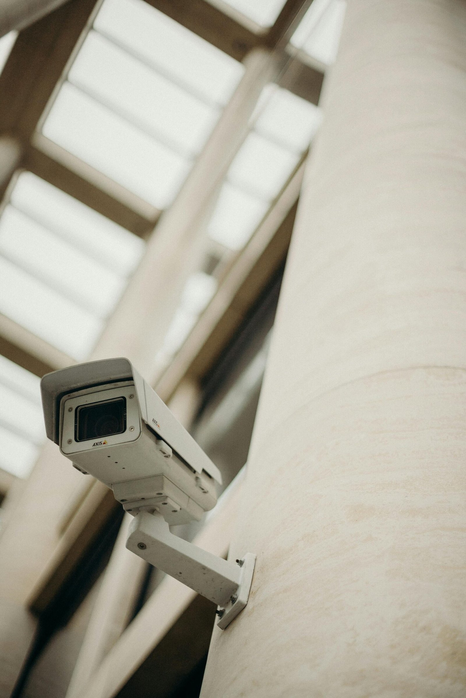 pexels photo 3205737 3205737 Close-up of a security camera on a building wall, showcasing surveillance technology.